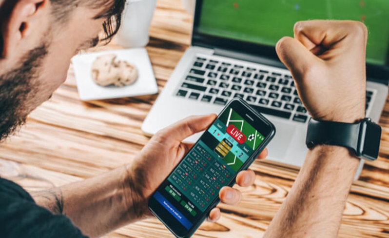 Can users track their betting history and view past bets through the mobile application?